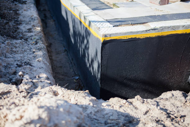 Professional Waterproofing technician working in Winchester, OH